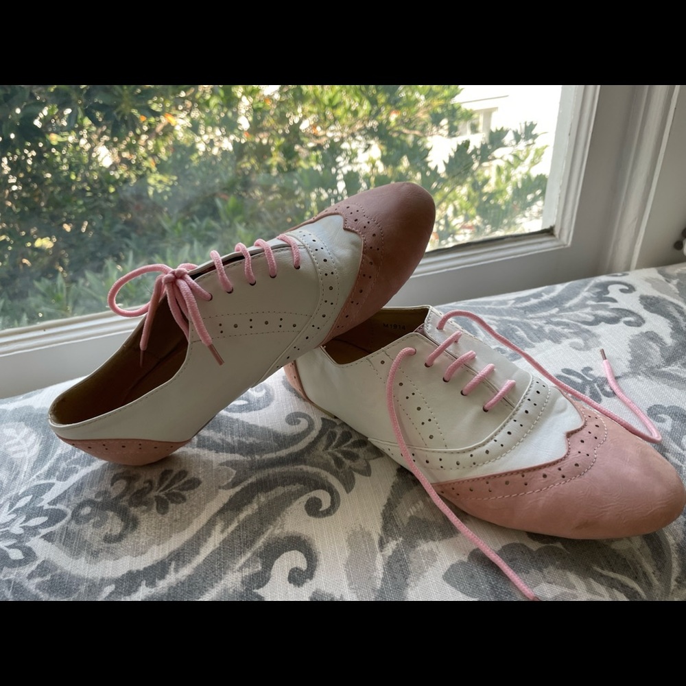 Light pink and white saddle shoes.